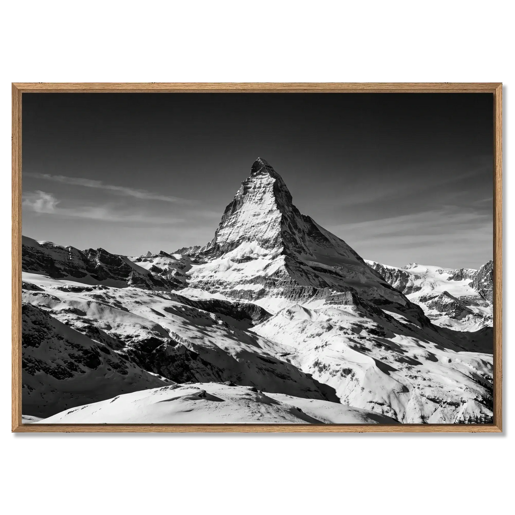 Matterhorn Eternal Contrast – Alu-Dibond wall art showcasing the majestic Matterhorn above a snowy alpine landscape.