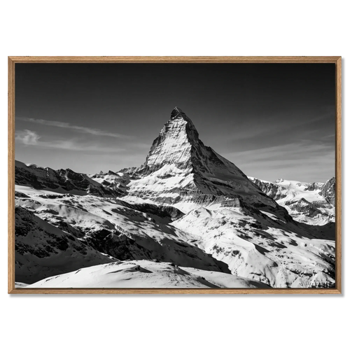 Matterhorn Eternal Contrast – Alu-Dibond wall art showcasing the majestic Matterhorn above a snowy alpine landscape.