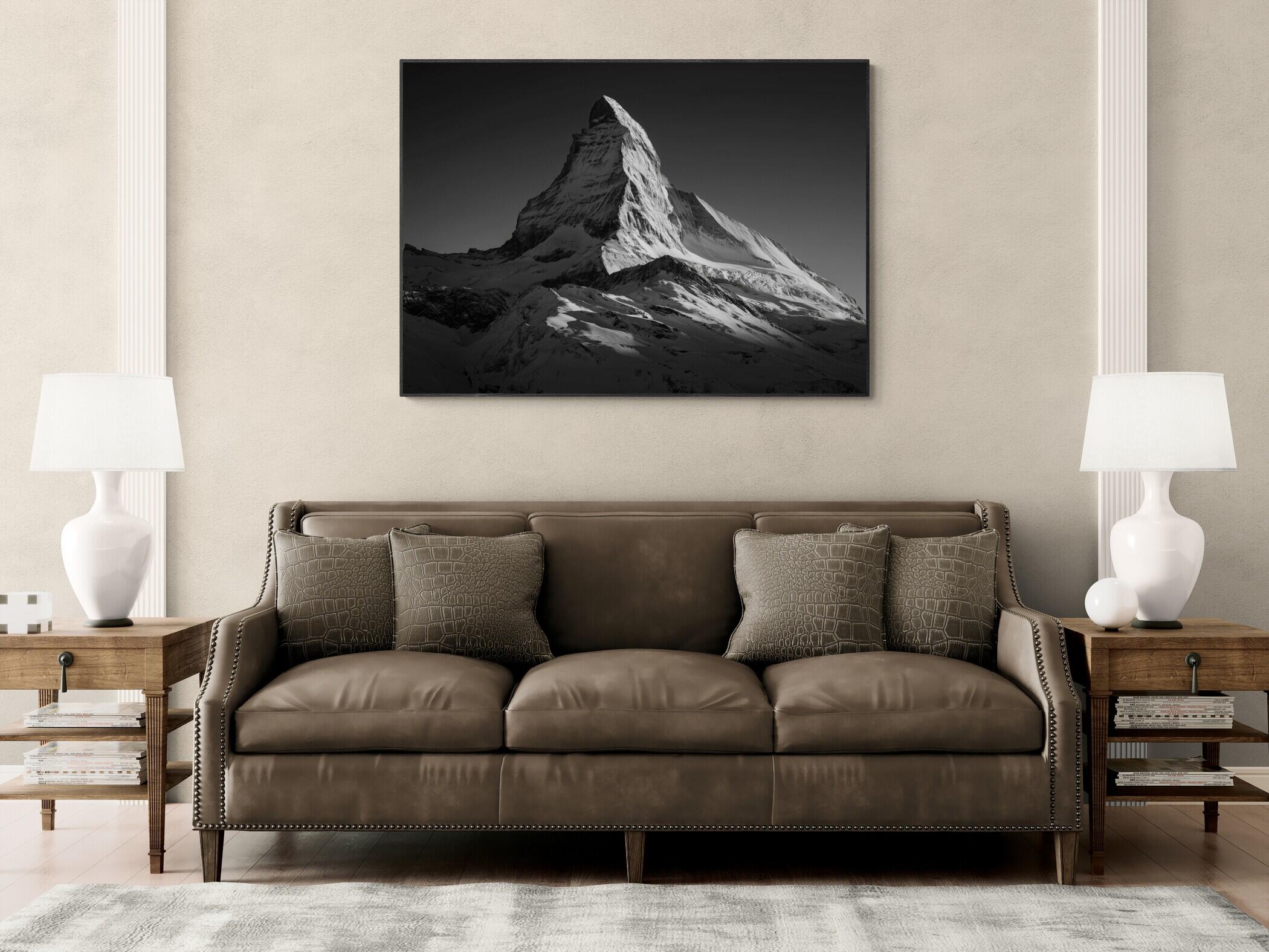 Matterhorn Light – Alu-Dibond wall art displayed above a sofa in a modern living room.