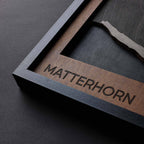 Close-up of Matterhorn: Multilayered Plywood Artwork framed, showcasing its intricate design and natural wood textures.