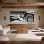 Matterhorn Chalet View – Alu-Dibond wall art in a rustic living room setting, showcasing alpine landscape.