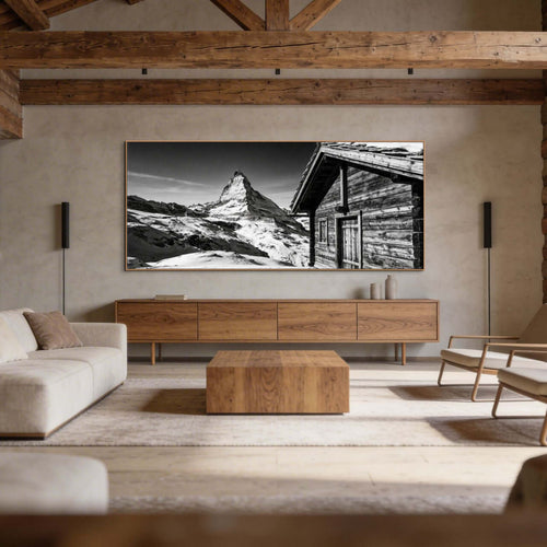Matterhorn Chalet View – Alu-Dibond wall art in a rustic living room setting, showcasing alpine landscape.