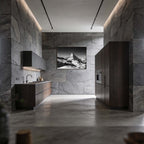 Matterhorn Eternal Contrast – Alu-Dibond wall art displayed in a modern kitchen interior with stone walls.