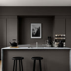 Mysterious Lift - Poster displayed in a modern kitchen with a dark color scheme and minimalist design.