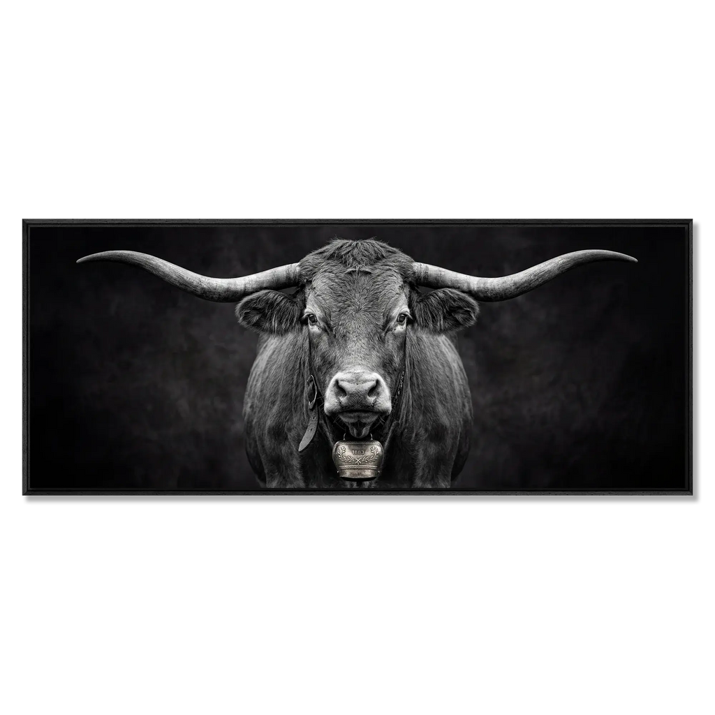 Presence of a Cow - a striking black and white image of a Swiss cow with a bell, embodying alpine identity.