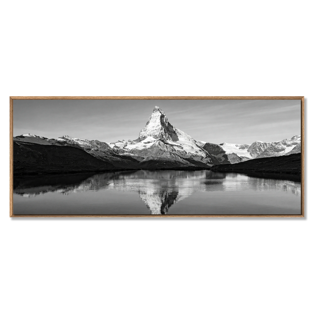 Reflection of the Matterhorn – Alu-Dibond wall art depicting a black and white image of the Matterhorn reflected in water.