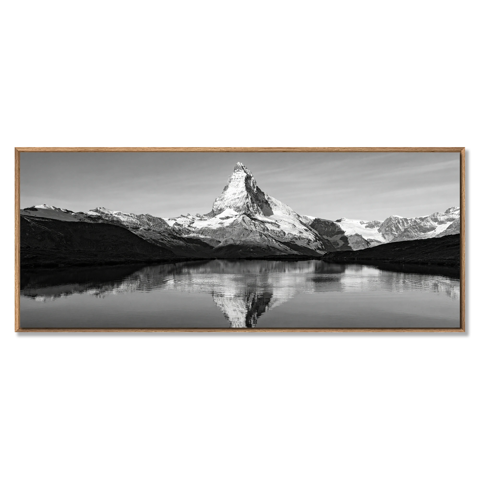 Reflection of the Matterhorn – Alu-Dibond wall art depicting a black and white image of the Matterhorn reflected in water.