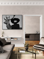 Silent Dialogue Woman and Deer – Alu-Dibond wall art displayed in a modern living room setting.