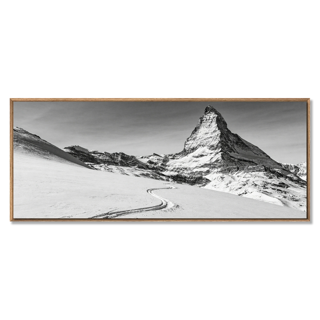 Silent Route to the Matterhorn – Alu-Dibond wall art featuring a ski track leading to the snowy Matterhorn.