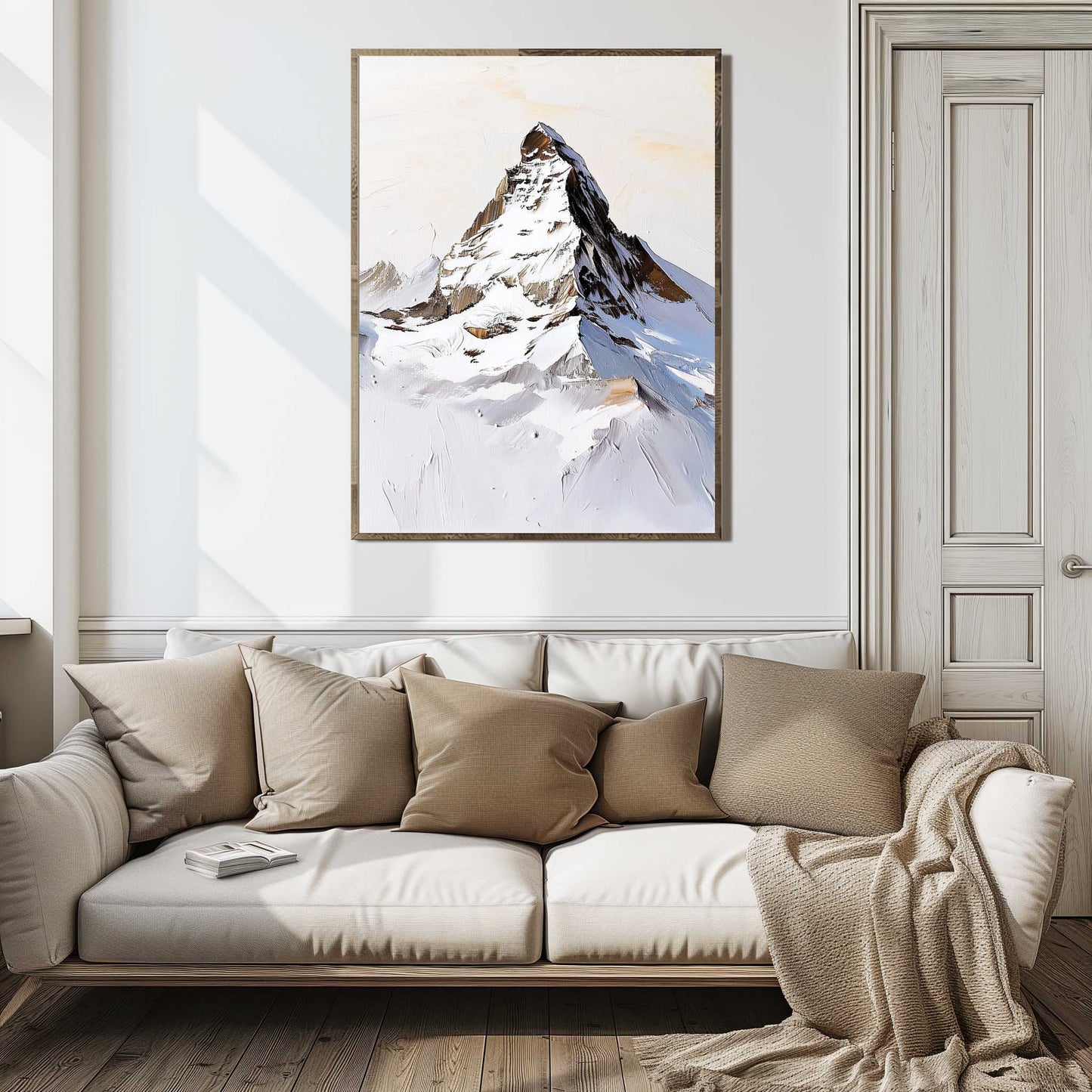 This image showcases a striking painting of a snow-covered mountain peak, likely inspired by the majestic Matterhorn. The artwork features bold brush strokes and a mix of white, brown, and blue hues, capturing the rugged beauty of the alpine landscape.