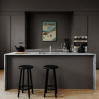 St. Anton - Skiers’ Paradise - Poster displayed in a modern kitchen with minimalist decor and black stools.