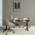 Modern office with St. Moritz - Poster artwork on the wall, featuring cozy winter village scene.