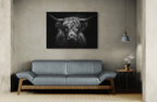 Strength of a highland cow - Alu-Dibond wall art displayed above a modern sofa in a stylish interior.