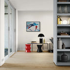 Two skiers on the mountain - Poster displayed in a modern living room interior with stylish furniture.