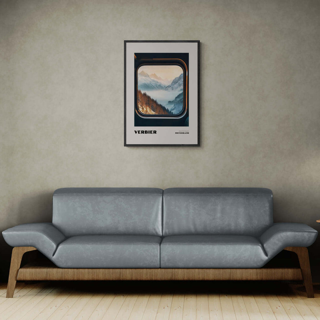 Verbier - Alpine Ski Paradise - Poster framed on a wall above a modern grey sofa in a stylish interior.