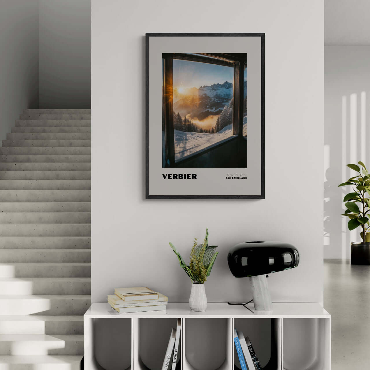 Verbier - The Heart of the 4 Vallées - Poster displayed in a modern interior, showcasing snowy mountains and warm sunrise.
