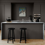 Verbier - Alpine Thrill - Poster displayed in a modern kitchen setting with minimalist decor and stylish bar stools.