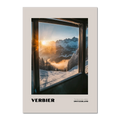 Verbier - The Heart of the 4 Vallées - Poster featuring a sunrise view over snowy mountains through a lift window.