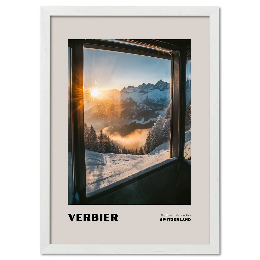 Verbier - The Heart of the 4 Vallées - Poster showcasing a sunrise over snowy mountains framed by a mountain lift window.