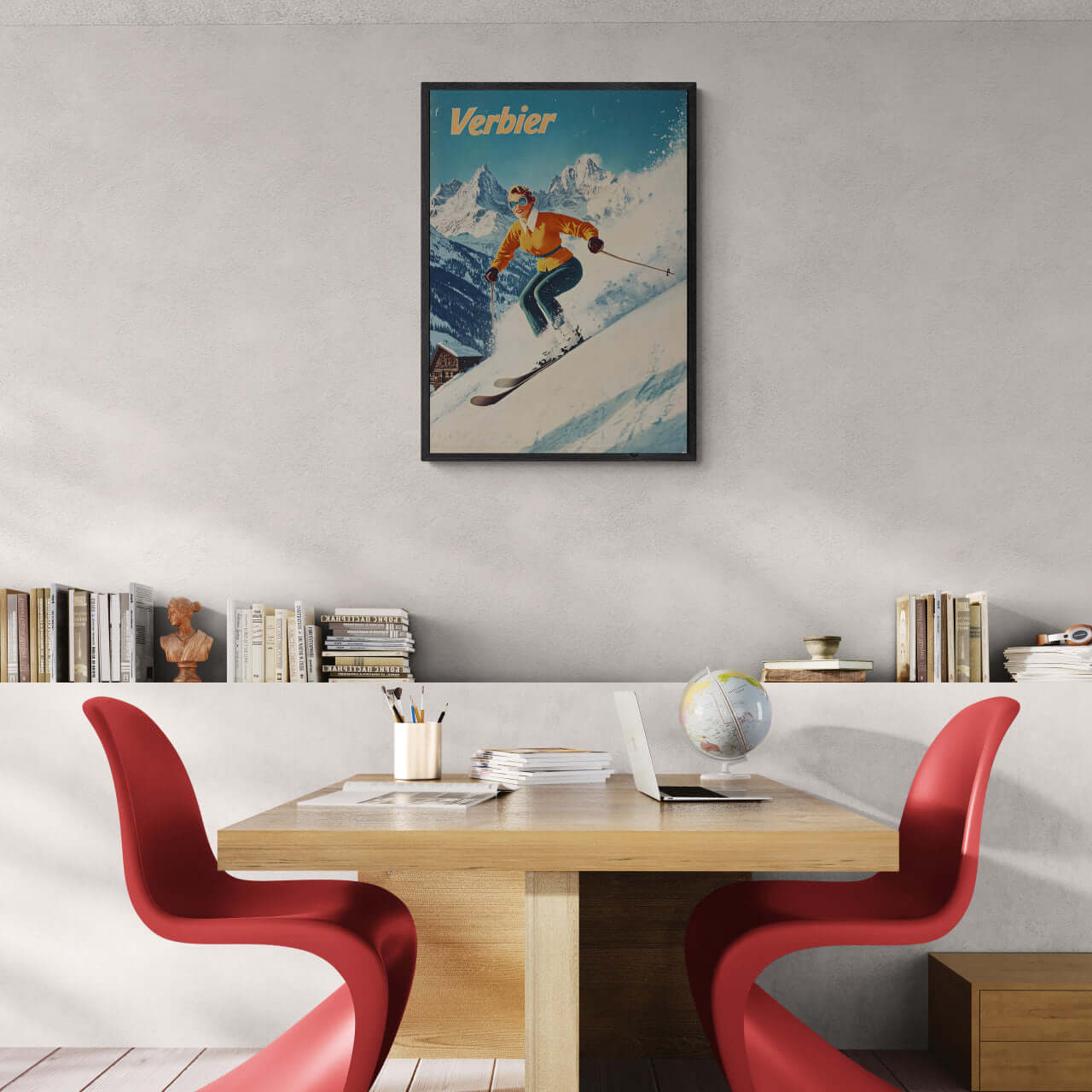 Verbier - Stylish Skier - Poster displayed in a modern workspace with red chairs and wooden table.