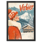 Verbier - Winter Elegance - Poster featuring a woman in a red coat by snowy mountains and a wooden chalet.