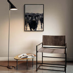 Wagyu Leader - Poster featuring black cattle wall art in a modern living space with minimal furniture.