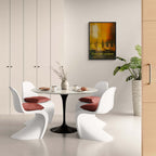 Wine evening - Poster displayed in a modern dining area with a round table and white chairs.