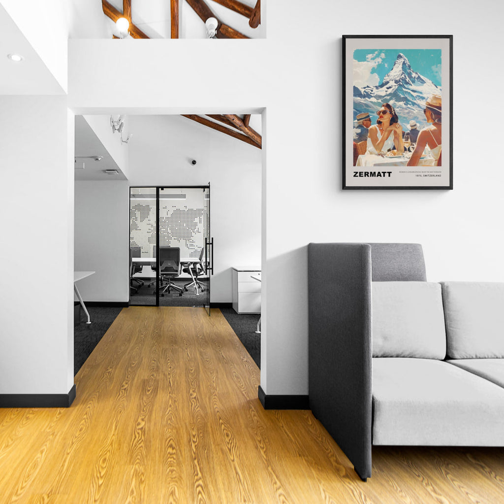 Women's conversations in Zermatt - Poster displayed in a modern office interior with wooden flooring and stylish furniture.